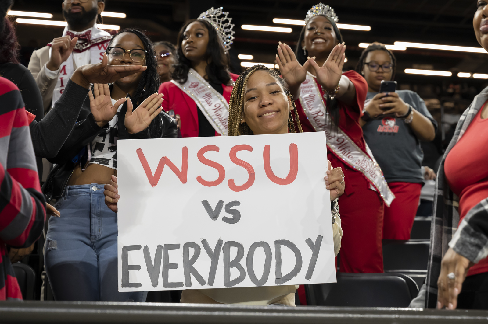 ram fans holding sign