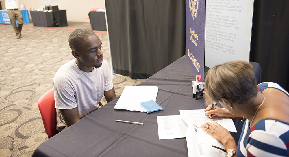 a student getting his passport