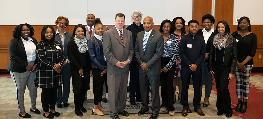 WSSU students and administrators stand with Golden Leaf Foundation president