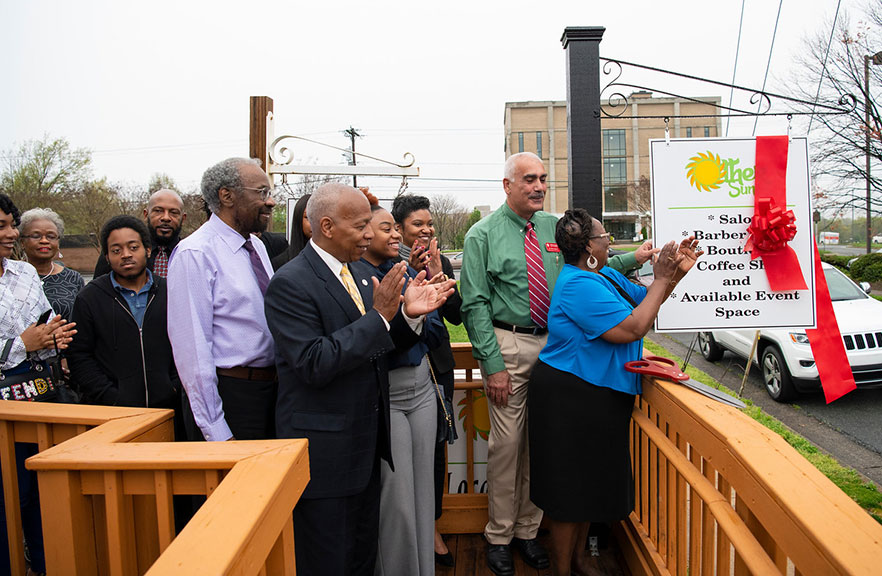 Ribbon cutting for new signage