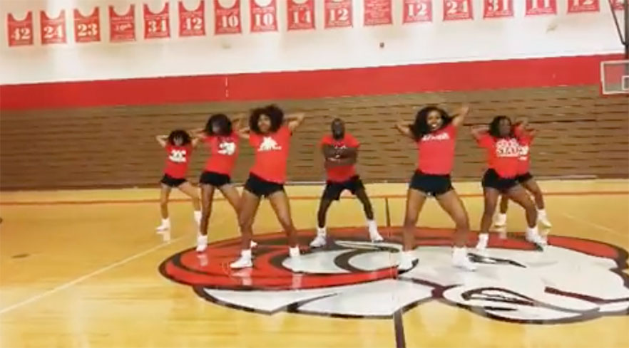 cheerleaders at center court with Ram logo