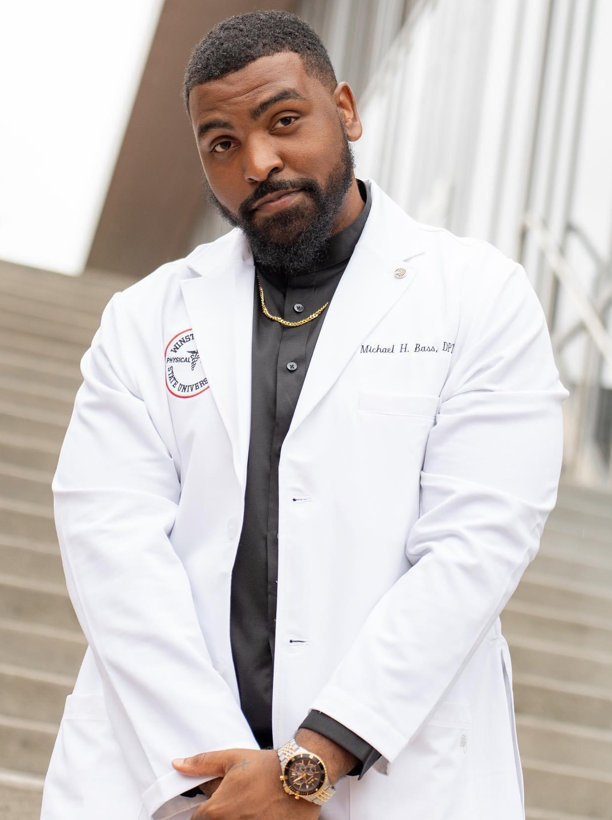 student in white coat