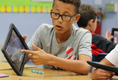 a boy with a tablet