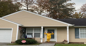 County Commissioner Tonya McDaniel in front of her house she bought through the homeownership program.