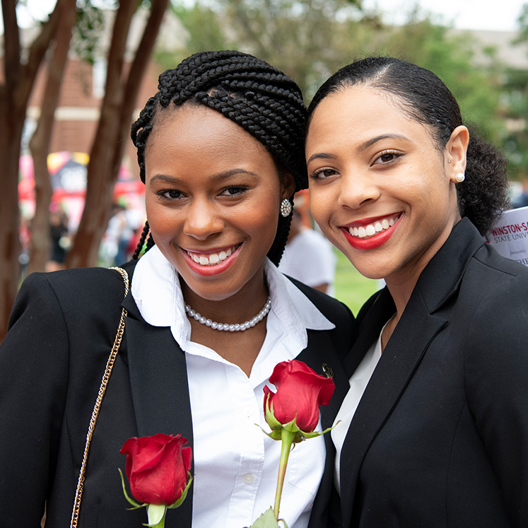 Women wearing formal attire