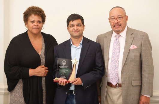 Dr. Fuad with Chancellor Reaves and Provost Allen.