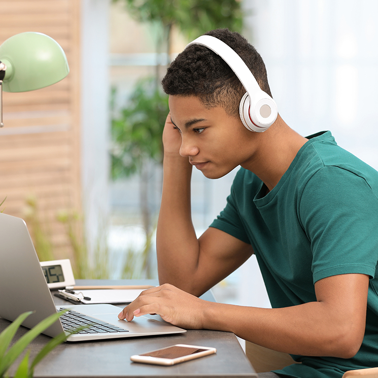 Man looking at his computer